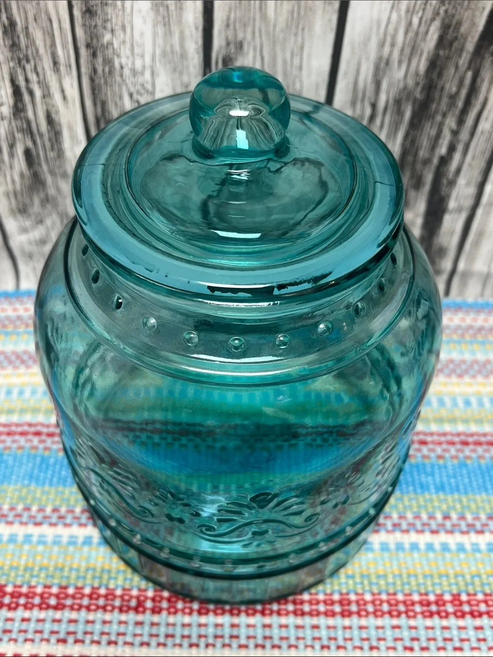 The Pioneer Woman “Cassie” glass Embossed Teal canister, large-80oz 6.25”X8”